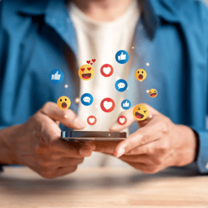 Person using phone with social media icons