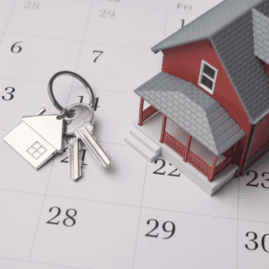 Real estate concept with calendar and keys.
